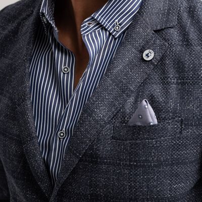 Giacca uomo destrutturata, realizzata in tessuto armaturato disegno madras sfumato